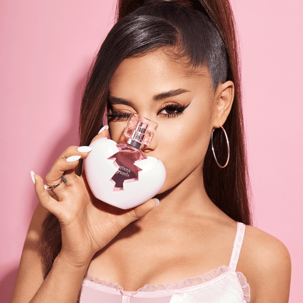 Thank U, Next by Ariana Grande, Ari kissing perfume bottle product shoot image